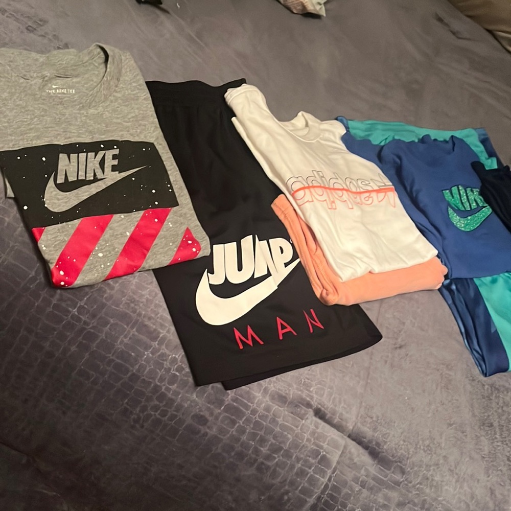 3 tees, 1 tank, 1 long sleeved , 3 shorts